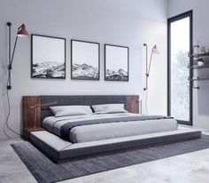 a bedroom with three pictures on the wall above the bed