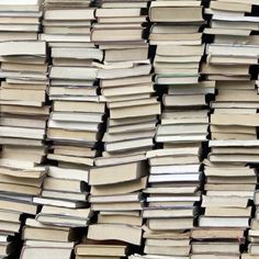 stacks of books stacked on top of each other