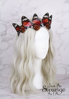 This is a must-have for all fairies! Here we have a beautiful tiara, fit for any fairy queen! This enchanting crown is comprised entirely of my handmade orange Monarch butterfly fairy wings. Please note these wings are made in the same style as my other pieces - they are light and ethereally translucent. They are not fully opaque (see photos).  The wings are attached a metal silver band, and adorned with clear and black gemstones. The wings are lightweight and far more durable than their glassy Monarch Butterfly Fairy, Butterfly Fairy Costume, Orange Monarch Butterfly, Elven Tiara, Festival Crown, Fairy Headpiece, Black Gemstones, Butterfly Fairy Wings, Butterfly Crown