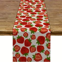 a table runner with strawberries on it