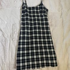 Never Worn Super Cute Black Plaid Mini Dress For Summer, Casual Black Sleeveless Plaid Dress, Spring Black Plaid Mini Dress, Black Plaid Mini Dress For Spring, Spring Black Plaid Mini Length Dress, Summer Black Plaid Dress, Black Mini Length Plaid Dress For Spring, Black Fitted Mini Sundress, Casual Black Plaid Cotton Dress