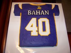 a cake that is shaped like a football jersey with the number 40 on it,