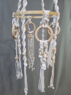 a mobile with ropes and rings hanging from it