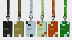 an assortment of lanyards with different colors and designs on them, all in the same row