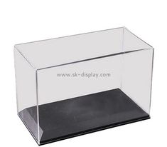 a clear plastic box with black bottom and side panels on the sides, for display