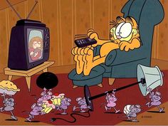 the simpsons is watching tv with his family