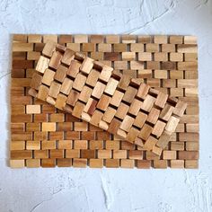 a piece of wood that has been made out of squares