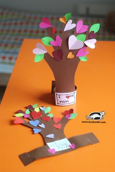 a tree made out of paper on top of a table