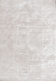 a white rug with an abstract design on the bottom, and a light gray background