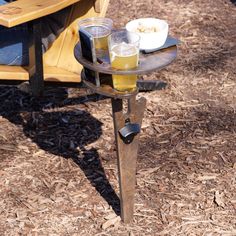 a table that has some drinks on it in front of a person's legs