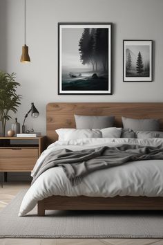 a large bed sitting in a bedroom next to two pictures on the wall above it