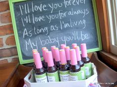 a chalkboard with writing on it next to bottles of baby formulas