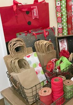 christmas presents are wrapped in brown paper and tied with red twine on the table