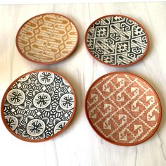 Add a touch of bohemian style to your dining table with this set of four World Market appetizer plates. Featuring a Nomad Elephant pattern inspired by folk art, these round plates are made of durable melamine material and come in a vibrant multicolor design. Perfect for all occasions, these plates are sure to add a pop of color to any table setting. The set includes four plates and is an original World Market brand product made in China. Whether you're serving appetizers or a salad, these plates are a great addition to any kitchen or dining room. Personalization is not available for this item. Order now and add some unique flair to your dining experience! Bohemian Dinnerware, Ethiopian Decor, Hand Building Ceramics, Moroccan Plates, Ceramic Plates Designs, Unique Appetizers, Bohemian Table, Unique Plates, Apartment Living Room Design