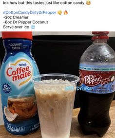 a cup of coffee next to a bottle of ice cream and a drink on a table