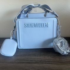 Nwt Bevelyn Steve Madden Purse Sky Blue / Baby Blue Viral Tiktok Purse Two Removable Straps Hand Handle Small Strap Removable Coin Pouch Zipper Compartment Snap Compartment Silver Tone Hardware No Returns! Please Message Me If You Have Any Questions Blue Purses And Handbags, Baddie Purses, Steve Madden Bags Handbags, Discipline Life, Expensive Purses, Expensive Bag, Steve Madden Purse