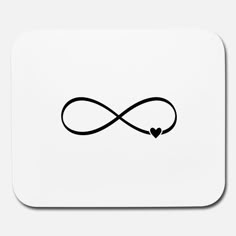 an infinite love symbol in black ink on a white mouse pad