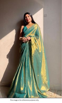 Bollywood Replica SareeBollywood Model Golden Pastel green tissue silk wedding sareeSaree fabric : In Heavy pure base double shade golden pastal green color glass tissue silk Blouse:Velvet material 0.80Mrts unstitched .Buy this Saree at Kollybollyethnics and make your occasion very special !!. With Express Free Shipping and Custom Stitching, Shop Bollywood Model Golden Pastel green tissue silk wedding saree at kollybollyethnics from India with free worldwide shipping. Green Tussar Silk Pre-draped Saree With Dupatta, Green Pre-draped Saree With Dupatta, Green Tussar Silk Pre-draped Saree, Green Tissue Silk Pre-draped Saree For Festive Occasions, Festive Green Tissue Silk Pre-draped Saree, Green Blouse Piece With Sheer Dupatta For Festive Occasions, Navratri Green Tissue Silk Blouse Piece, Green Anarkali Blouse Piece In Tissue Silk, Green Tissue Silk Blouse Piece For Navratri