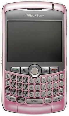 a pink blackberry cell phone sitting on top of a white surface