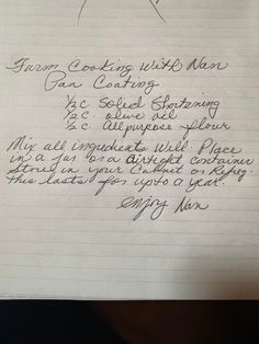 a piece of paper with writing on it that has been written in cursive handwriting