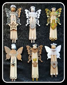 six wooden peg dolls with different designs on them