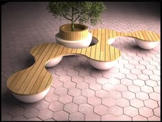 a wooden bench sitting on top of a brick floor next to a potted plant