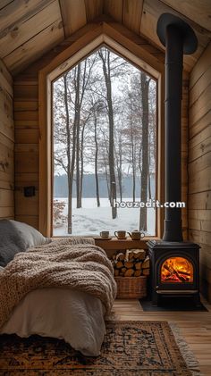 a bedroom with a wood stove in the corner