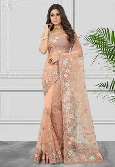 Net Saree with blouse in Peach colour 6899  Desc:  Color : Peach Fabric : Net Work : Embroidery   Sequence Wash Care : Dry clean Sleeve Style : Half Sleeve Long Sleeves : Done only in Custom Stitch Sleeves Lining : Done only in Custom Stitch Bust Size : 32 to 42 Inches Occasion : Wedding   Festival   Diwali   Mehendi   Sangeet   Engagement   Reception   Ceremonial. With Express Free Shipping and Custom Stitching, Buy Indian Party wedding and bridal Sarees Net Saree with blouse in Peach colour 68 Diwali Mehendi, Saree For Engagement, Peach Color Saree, Classic Saree, Peach Saree, Engagement Reception, Peach Colour, Indian Designer Sarees, Peach Blouse