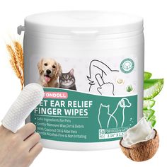 a person holding a cat and dog in front of a can of pet ear relief finger wipes