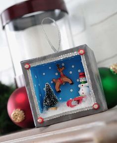 a christmas ornament hanging from a shelf