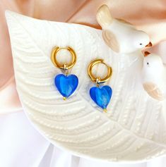 -----------  Heart shaped glass earrings ---------------- Original earrings will add brightness to your look. The earrings come gift box with a satin ribbon. This can be a great gift! Important 30% of the profits go to helping stray animals. Let's do good together! Heart Beads Drop Earrings For Gift, Trendy Blue Jewelry With Heart Charm, Blue Drop Earrings As Gift For Her, Blue Jewelry For Valentine's Day Party, Blue Dangle Earrings As A Gift For Her, Nickel Free Blue Earrings As Gift For Her, Blue Heart Earrings For Pierced Ears As Gift, Blue Heart Earrings Nickel Free For Gift, Trendy Blue Heart Earrings For Gift