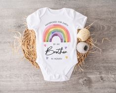 New baby gift, baby vest, rainbow baby, baby born after loss, handpicked for earth, brother in heaven, new baby gift, babby shower present, for couples, for them, Handpicked for earth by my brother in heaven. (brother can be changed to any relative) From our childrens range we bring you this rainbow new baby vest which is a perfect gift for a new baby born after a loss. The baby vest is an ideal gift for a baby shower, or for your baby's 1st photoshoot. The vest is also an ideal coming home outfit for your new bundle of joy. The short sleeved baby vest is printed using the highest quality inks ensuring a long lasting design. The vest is a super soft feel made from 65% polyester and 35% cotton, with 3 Nickel free poppers. The romper features an envelope neck to help with easy dressing and u My Brother In Heaven, 1st Photoshoot, Babby Shower, Baby Boy Vest, Rainbow Baby Gift, Boys Vest, Hubby Love, Baby Vest, Easy Dressing