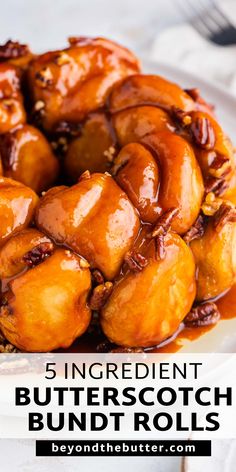 a white plate topped with fried butterscotch bundts covered in caramel sauce