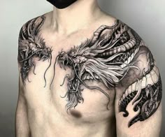 a man with a dragon tattoo on his chest