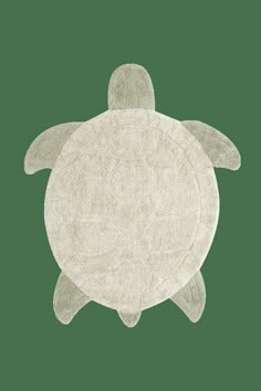 an animal rug with a turtle on it's back, in grey and white