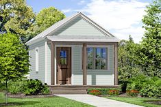 the small house is painted white and has brown trim on the front door, windows, and porch