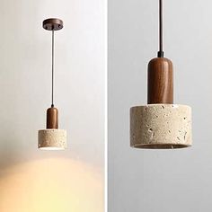 two different types of light fixtures hanging from the ceiling, one is made out of concrete and the other is wood