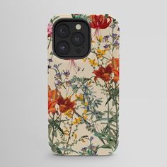 an iphone case with colorful flowers and leaves on it, all printed in different colors