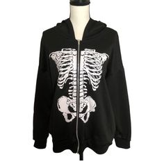 Full Zip Hoodie Skeleton On The Chest And Arms Ideal For The New Season Without Tag It Has A Dimple At The Height Of The Arm, It Is Shown In The Last Photos, It Can Be Repaired Or It Does Not Affect It, It Is Not Very Noticeable Smoke/Pet Free Home Approximate Measurements At The End Of The Photos Unisex Size:S Reasonable Offers Accepted Fast Shipping Goth Zip Up Hoodie, Halloween Hooded Outerwear With Skull Print, Winter Skull Print Grunge Outerwear, Winter Skull Print Hoodie Outerwear, Halloween Grunge Outerwear With Skull Print, Grunge Halloween Outerwear With Skull Print, Grunge Hooded Outerwear For Halloween, Hooded Grunge Outerwear For Halloween, Halloween Long Sleeve Outerwear With Skull Print