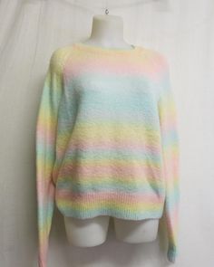 Retro Rainbow Sweater Steve Madden BB Dakota WOW!  Chunky knit sweater. Soft and cuddly Show your colors!  RAINBOWS and Sunshine  Large/XL 50" chest  Dropped shoulder  Sleeve 22" from underarm Hip 42" to 50" Length 25"   This is a Beauty.... don't miss out! Immaculate condition!  Acrylic  https://www.etsy.com/shop/BelindasStyleShop See my other sweaters! Pastel Rainbow Sweater, Rainbows And Sunshine, Digital Wardrobe, Pastel Sweater, Pull Oversize, Rainbow Sweater, Sweater Oversize, Retro Rainbow, Bb Dakota