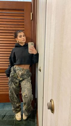 camo pants, cropped black hoodie, mirror pic, ootd, outfit inspo, streetwear outfits, slick back hair, jewlery, jordan 4s off white  outfit Outfit Inspo Casual, Looks Street Style, Streetwear Fashion Women, Swaggy Outfits, Fashion Mistakes, Cute Everyday Outfits, Baddie Outfits Casual, Fashion Streetwear, Cute Simple Outfits