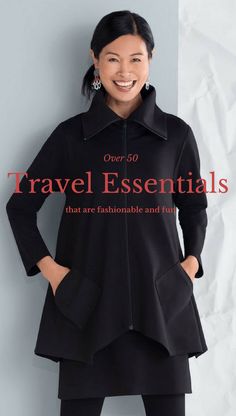 a woman standing in front of a white wall with the words travel essentials on it