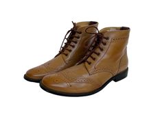 Vintage Tan Brown Leather Wing Tip Brogue Lace Up Derby Ankle Boots Size 43 EU / UK men 8 1/2 / US men 9 Size marked on the sole 43 EU Brand: Unze London Measurements: Length Insole Inside: 29.5 cm / 11 1/2 inches  Length Sole Outside: 31 cm / 12 1/4 inches  Width of the Sole at the widest part: 11 cm / 4 1/4 inches Height of the boots: including the heel: 16.5 cm / 6 1/2 inches  Height of the heel: 2.5 cm / 1 inch Outer: Leather Inner: Textile  Sole: Man made material Used. Good Vintage Conditi Plain Toe Brown Lace-up Boots For Derby, Brown Ankle Boot Lace-up Boots For Derby, Brown Ankle Lace-up Boots For Derby, Brown Wingtip Lace-up Shoes With Leather Lining, Brown Wingtip Lace-up Boots With Leather Lining, Shoulder Strap Bag, Canvas Messenger Bag, Us Man, Mens Shoes Boots