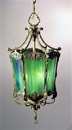 a green lamp hanging from the ceiling