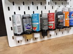 several different types of motor oil on a shelf