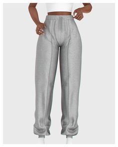 a woman in grey sweat pants with her hands on her hips