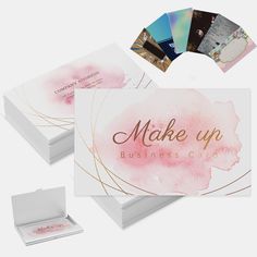 the business card is designed to look like it has been painted with watercolors