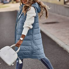 Women's Long Winter Coat Vest With Hood Sleeveless Warm Down Coat With Pockets Quilted Vest Down Jacket Quilted Outdoor Jacket SizeUSEUBustShoulderLengthS434102cm36cm96cmM636108cm38cm98cmL838114cm40cm100cmXL1040120cm42cm102cmXXL1242126cm45cm104cmXXXL1444132cm48cm106cmXXXXL1646138cm51cm108cmXXXXXL1848144cm54cm110cmSize:SUS:4EU:34Bust:102cmShoulder:36cmLength:96cmSize:MUS:6EU:36Bust:108cmShoulder:38cmLength:98cmSize:LUS:8EU:38Bust:114cmShoulder:40cmLength:100cmSize:XLUS:10EU:40Bust:120cmShoulder:4 Bodywarmer Outfit, Puffer Vest Outfits, Winter In Italy, Layering For Winter, Campus Fashion, Style Winter Outfits, Minimalist Wardrobe Essentials, Long Winter Coats Women, Puffer Vests