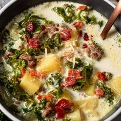 a bowl filled with broccoli, cheese and meat