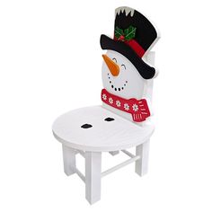 a snowman sitting on top of a white wooden chair